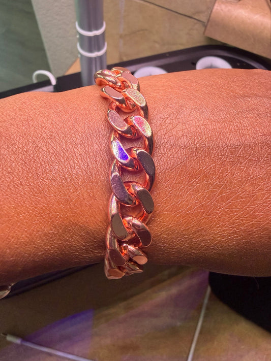 7-inch copper Cuban link bracelet on wrist