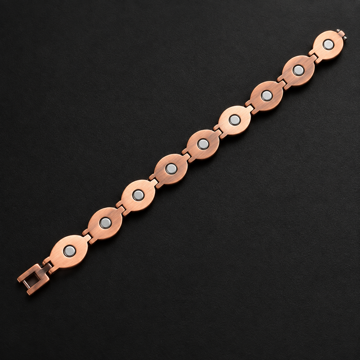 Underside of The Oval Multi Stone bracelet showing nine neodymium magnets