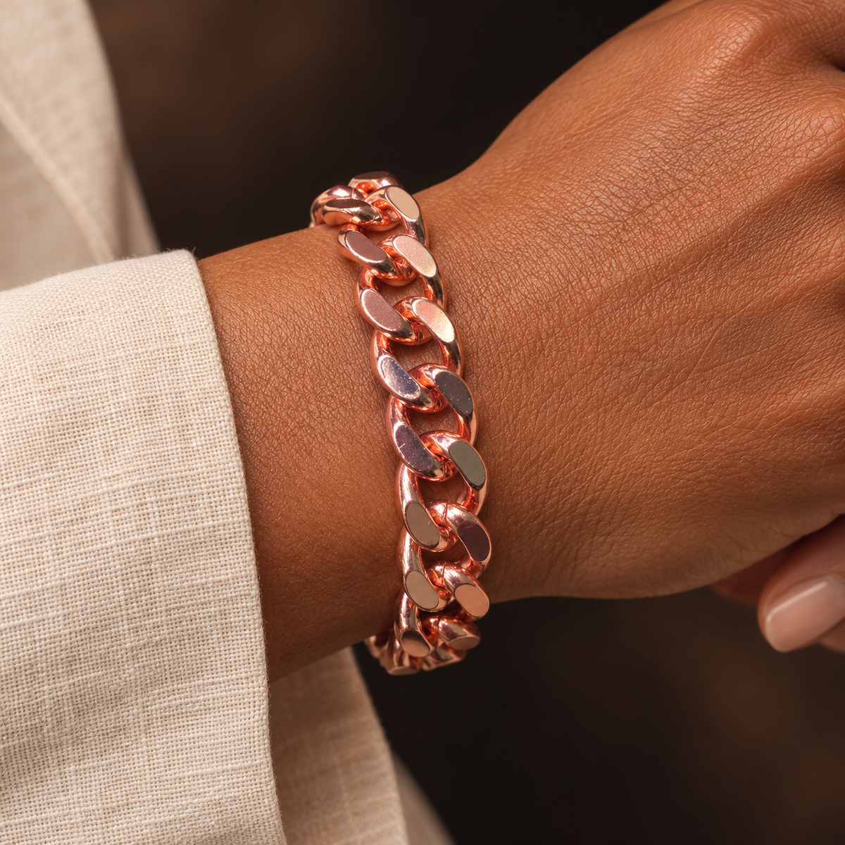 Afro-Indigenous female wearing 7-inch copper Cuban link bracelet