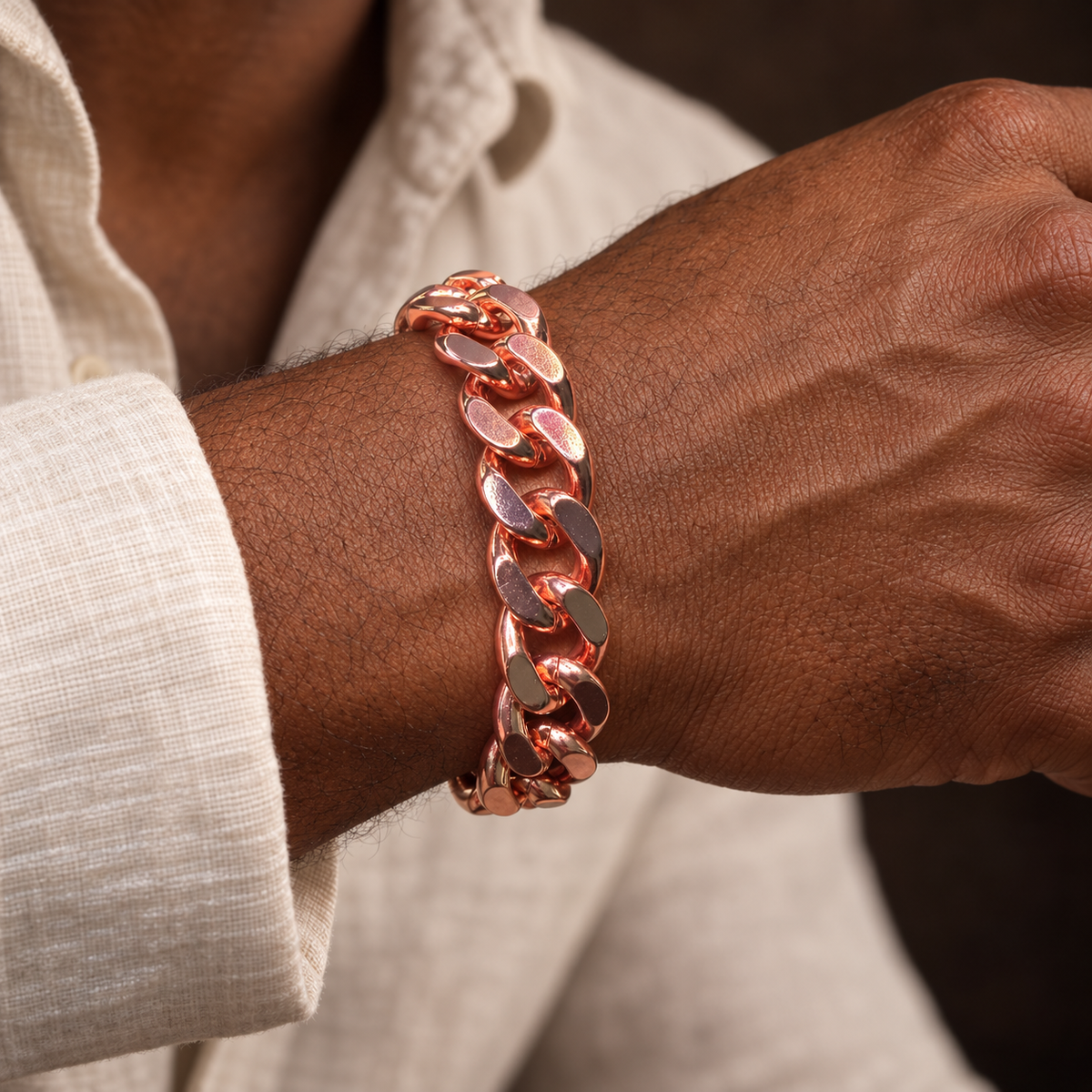 Afro-Indigenous male wearing 7-inch copper Cuban link bracelet