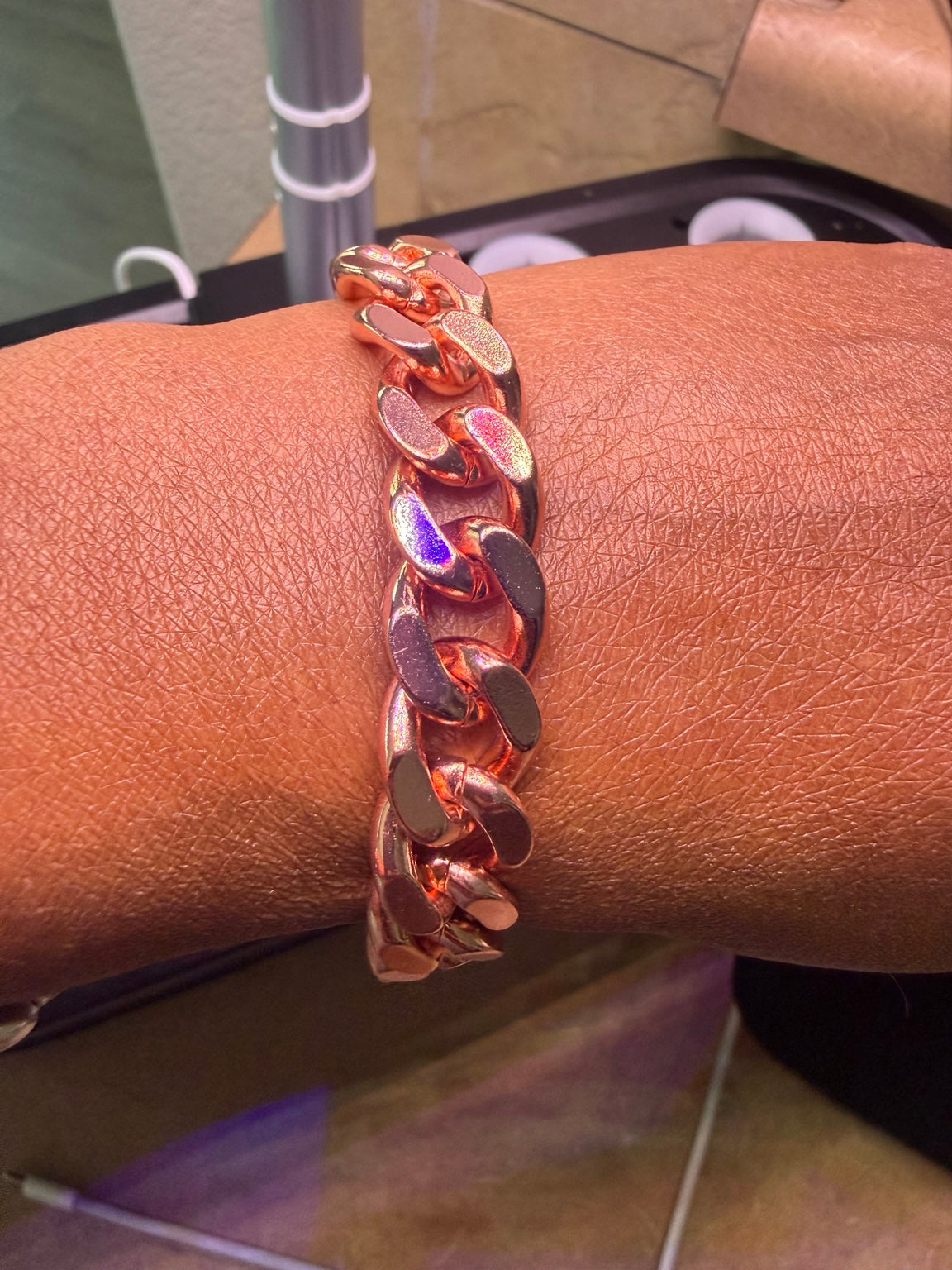 7-inch copper Cuban link bracelet on wrist