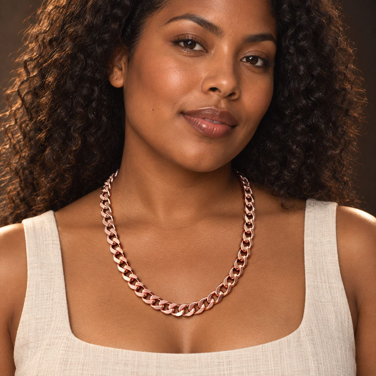 Afro-Indigenous female wearing 22-inch copper Cuban link necklace