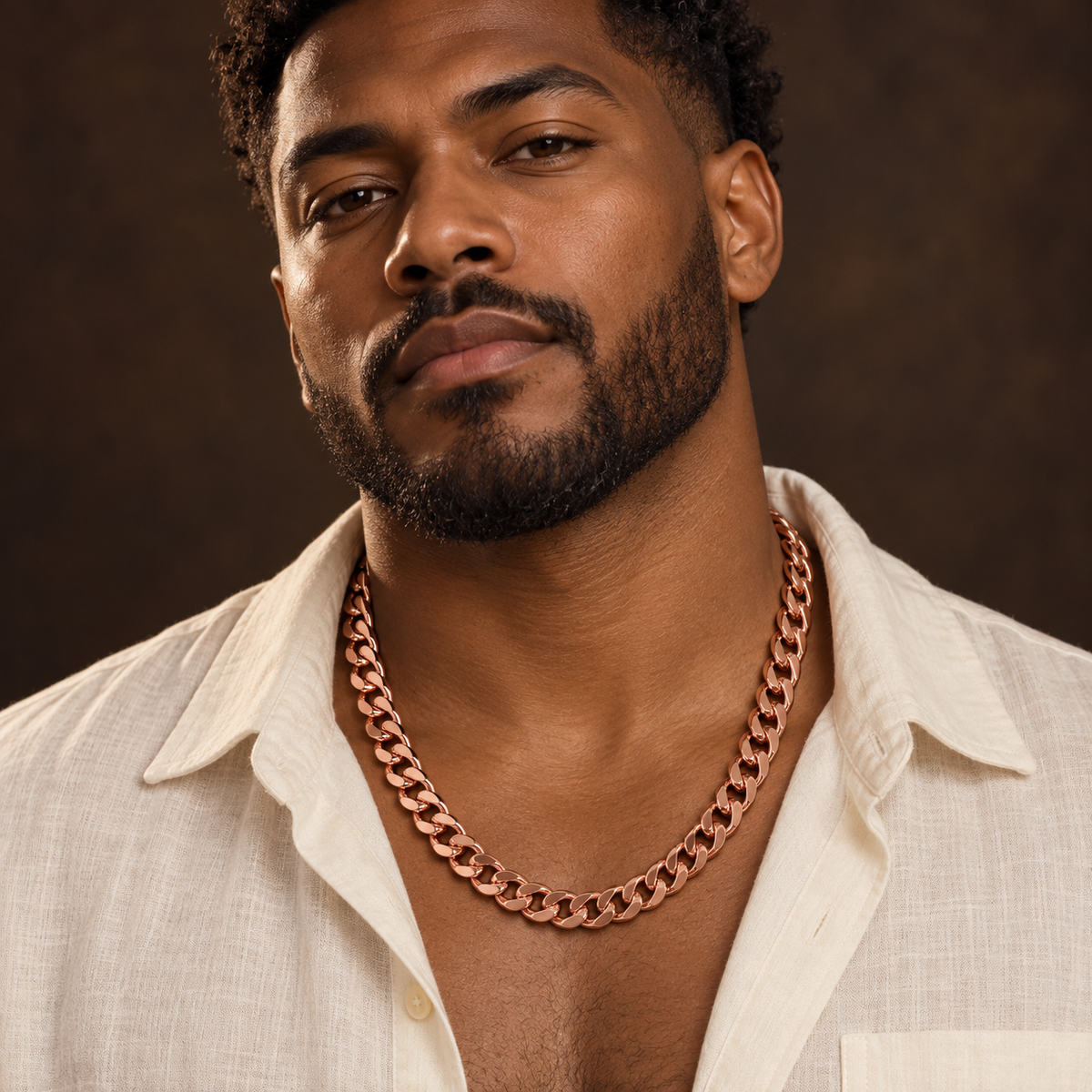 Afro-Indigenous male wearing 22-inch copper Cuban link necklace