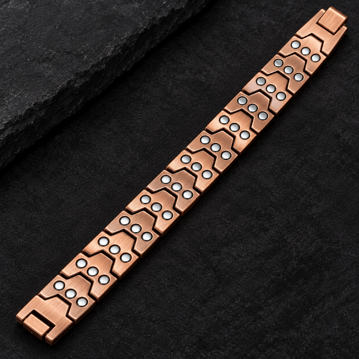 Underside of Sacred Armor bracelet showing three neodymium magnets per link
