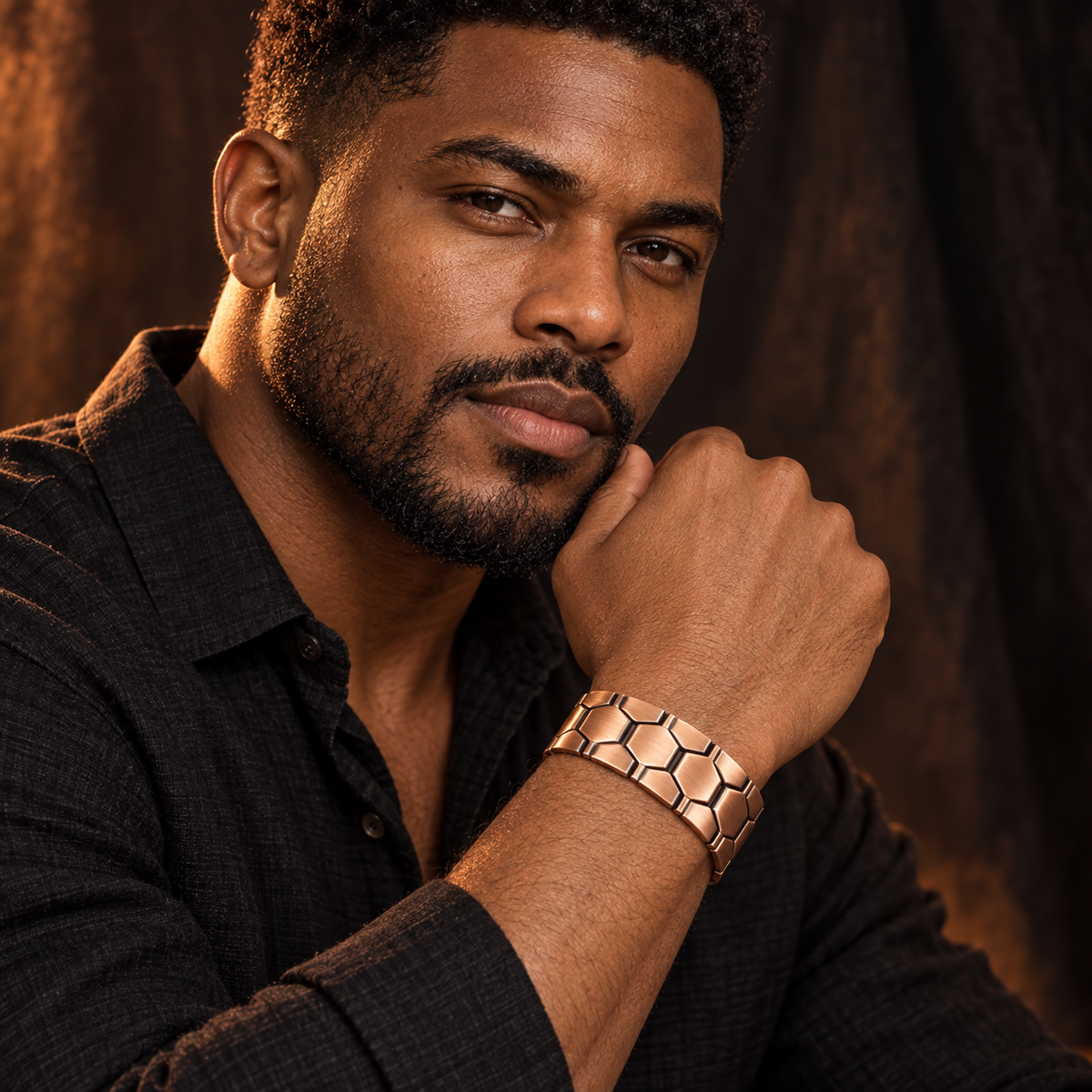 Afro-Indigenous man wearing the Sacred Armor copper magnetic bracelet