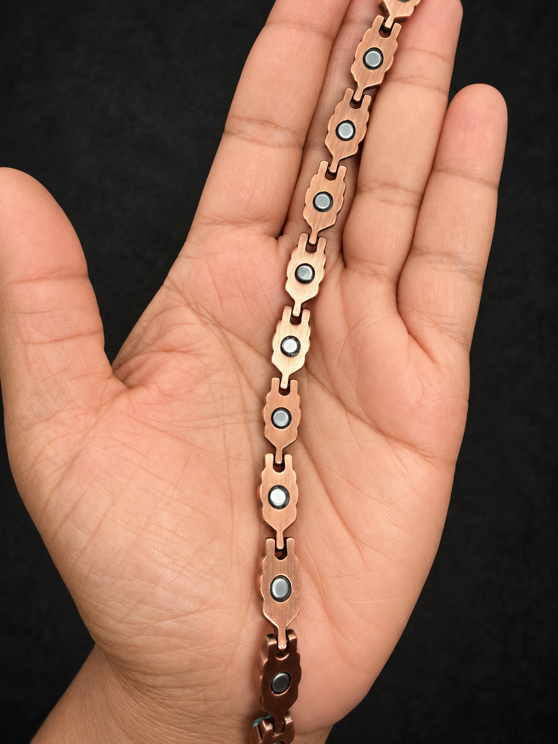 Copper underside of Sacred Heart Multi Stone bracelet showing neodymium magnets