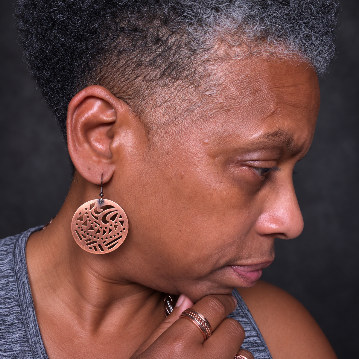 Sha wearing pure copper geometric disc earrings
